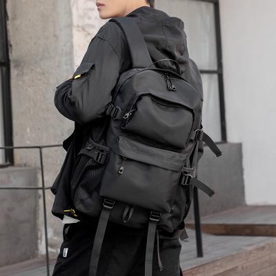 China Waterproof Student School Bag Fashion Trend Large Capacity Backpack Male College Student Travel Backpack Man Bag for sale