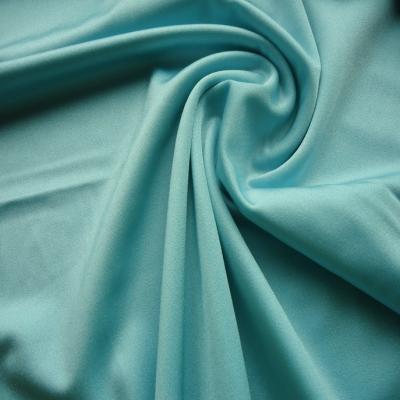 China Simple Shiny Bright Nylon Spandex 4 Way Stretch Lycra Swimwear Fabric for sale