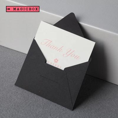 China Low MOQ 220g Luxury Custom Shape and Size Wallet Style Black Envelope Cardboard Paper Gift Envelope Without Logo for sale