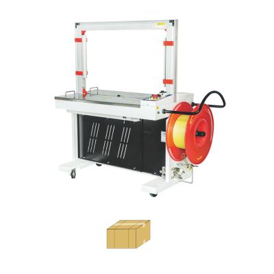 China Manual Automatic Food Bag Box Strapping Carton Tying Machine in Guangzhou Foshan City for sale