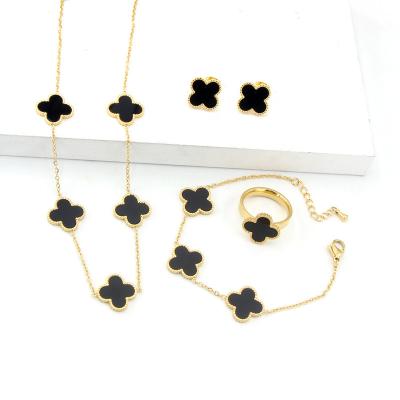 China Wholesale Environmental Friendly Fashion 18K Gold Plated Lucky Grass Flower Necklace Earrings Rings Stainless Steel Jewelry Set for sale