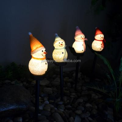 China Snowman String Light Best Selling Solar Cute Colorful Image Cartoon Snowman Christmas Products Smart Outdoors Flood Lights Manufacturer for sale