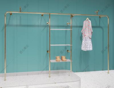 China Stainless Steel Wall Mounted Titanium Gold Clothing Display Rack Hanging Shelf In Clothing Store 886522 for sale