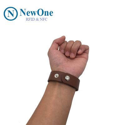 China Hospital medical treatment; Natatorium Waterproof Rfid Wristband Watch Tag Proximity Leather Wristband for sale