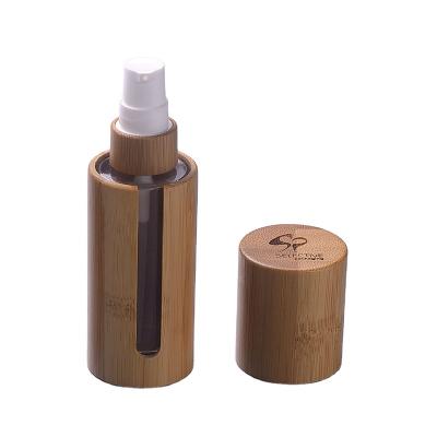 China Natural bamboo bottle cosmetic packaging 30ml/50ml empty lotion glass bottle bamboo cover with pump for sale