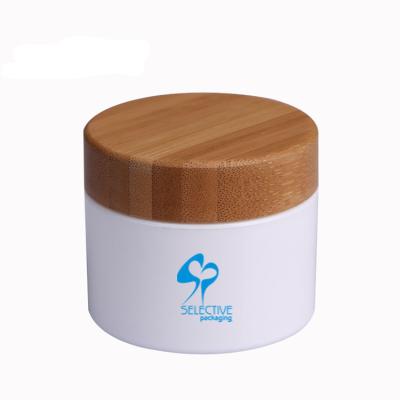 China 100g white pp jar with bamboo lid cosmetic jar eco-friendly cosmetic packing for sale