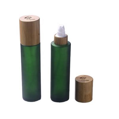 China 30ml 50ml 100ml 150ml Frosted glass bottle cream jar with bamboo lid for sale