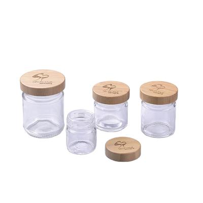 China different size square bottle empty Cosmetic Glass Jars with wood lid for sale