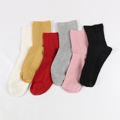 China soft knitted short crew cotton solid plain colored girls dress socks for sale