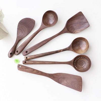 China 5 PCS Sustainable Wooden Handmade Natural Walnut Cookware Set Kitchen Spoons Wooden Spoons for sale