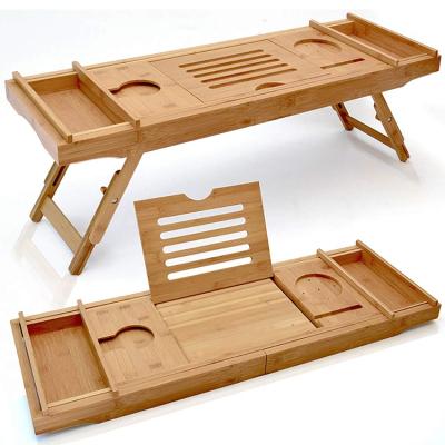 China Sustainable Wooden Bamboo Bath Cart Tray With Wine Book Holder and Extendable Sides Extending Handmade Legs for sale