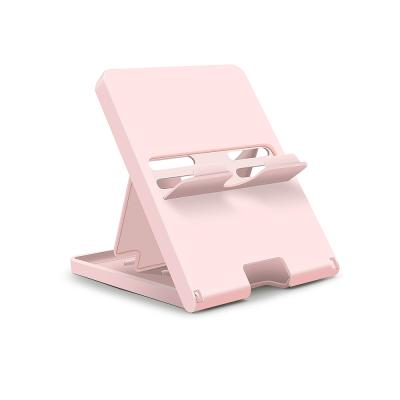 China Plastic Pink Color Filler Display Stand For Nintendo Switch for sale