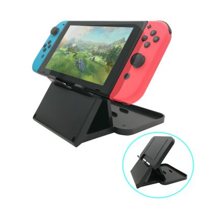 China Wholesale Plastic Black Plastic N Switch Console Holder Bracket for sale