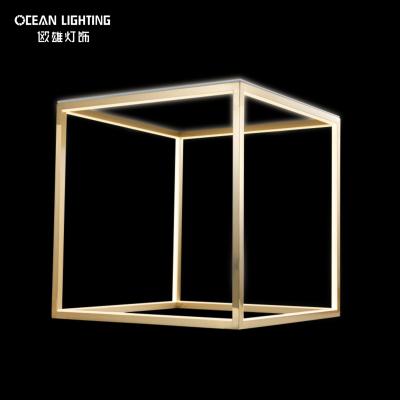 China Modern Bedside CubeTable Square Home Hollow Bedroom Desk Lamp Noedic Gold Bed Side LED Table Lamps Gold Bedside Study for sale