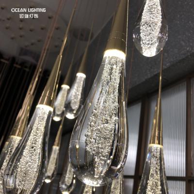 China Modern Hotel Bedroom Luxury Metal 10 Heads Water Drop Shape Crystal Light Pendant Lamp Chandeliers for sale