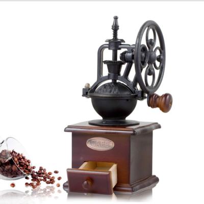 China Retro Ferris Food Grade Hand Wheel Hand Wheel Coffee Bean Grinder Ceramic Pepper Grinder Manual Grinder for sale