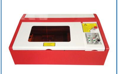 China Air Cooling CO2 Tempered Glass Screen Protector Cutting Machine Easy To Operate for sale