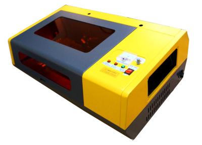 China Mini Phone Mobile Screen Protector Laser Cutting Machine 40 W Tempered Film Processor for sale