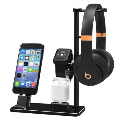 China Cell Phone Watch Headset Storage Charging Ipa and Cell Phone Tripod Watch Cell Phone Stand Charging Bracket 4 in 1 Stand Wireless Charging Stand for sale