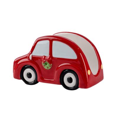 China Eco-Friendly Handmade Ceramic Car and Christmas Santa Shaped Napkin Holder for sale