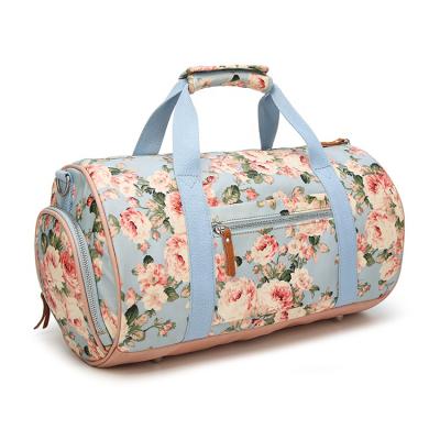 China Travel Bag with USB Charger Flower Print Traveling Duffle Bag Stylish Pink Portable Cable Stayed Luggage Travel Bag for sale