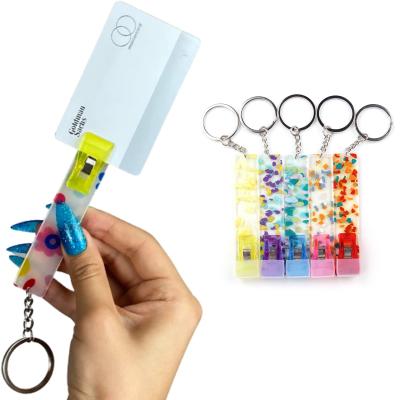 China Souvenir Gifts Promotion Custom Printed Cute Acrylic Credit Card Puller Key Chain With Pom Pom Long Nails ATM Debit Bank Card Grabber for sale