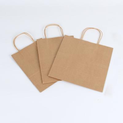 China Recyclable Good Quality Plain Foldable Kraft Paper Customized Logo Printed Kraft Paper Shopping Bags With Twist Handles for sale