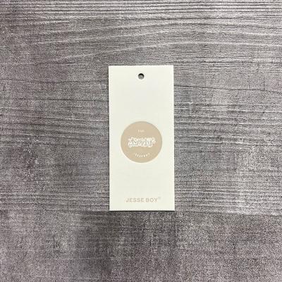 China Other Custom Shape Perforated With Printed Logo Printing Logo Fold Over Costom Branded Name Thickness Pants Hangtag for sale