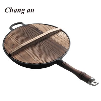 China Sustainable Chinese Wok With Lid Cast Iron Preseasoned Traditional Wok With Handle for sale