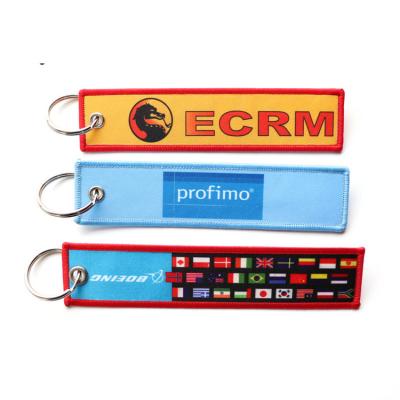 China Keychains Hot Sales Woven Key Chain Embroidered Custom Logo Designs For Gift for sale