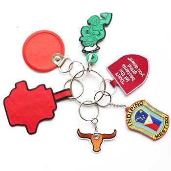 China Keychains Personalized Designs Logo Keyring Embroidery Custom Shape Keychain for sale