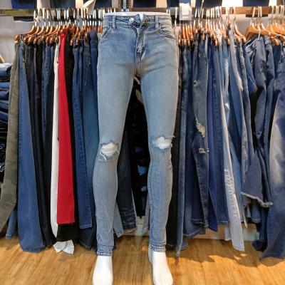 China Many GZY China factory directly sell stock lot of warehouse clearance denim men's skinny jeans for sale