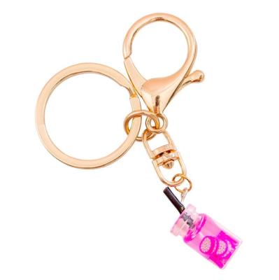 China Creative Metal Milk Tea Key Chain, OEM Drink Bottle Key Chain Girl Milk Tea, Custom Cute Key Ring Charm Bag Pendant Drinking Toy for sale