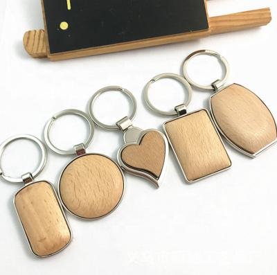 China Promotional Wooden Rectangle Heart Round House Shaped Custom Handmade LOGO Key Chain Charm Key Chain Engraving Wooden Carving Pendant Plug for sale