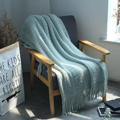 China Custom Nordic Style Office Nap Blanket Solid Color Knitted Sofa Decorative Blanket Hollow Tassel Anti-Static Bed End Blanket Throw for sale