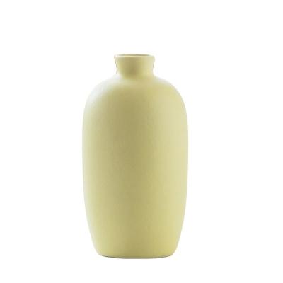 China Minimalist Promotional Good Quality Custom Yellow Home Ceramic Flower Vase for sale