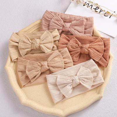 China Decoration Children's Hair Accessories Bow To Stretch Soft Jacquard Nylon Headband Accessories for sale