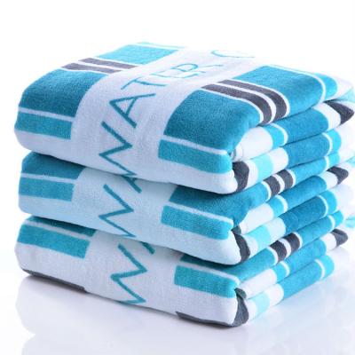 China Compressed 100% Cotton Striping Beach Towel Swimming Towel for sale