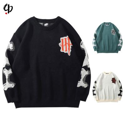 China Anti-pilling new lazy jacquard knit sweater men's street skull pattern knit sweater round neck men's pullover for sale