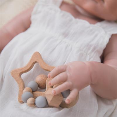 China Infant Teether Ring Baby Beads Teething Toy Wooden Silicone Baby Care Gift Bracelets High Quality Chewable Baby Toys New Design for sale