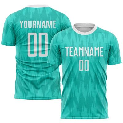 China Custom Sets Aqua White Football Uniform Set Sublimated Football Jerseys for sale