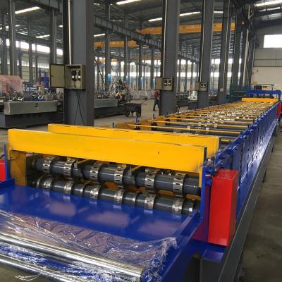 China Huaheng Hotels Colored Metal Deck Roll Forming Machine Sheet Roll Forming Machinery for sale