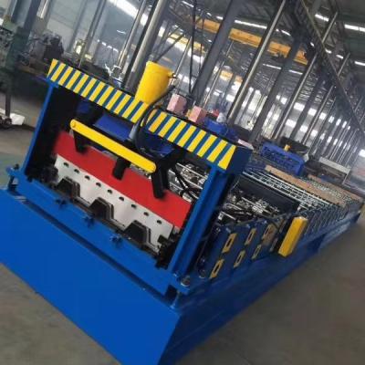 China Hotels New Product Metal Decking Cold Roll Forming Deck Machine Galvanized Steel Floor Tile Making Machine for sale