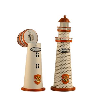 China Art Decor Wholesale Creative Mediterranean Style Home Candle Holder Decoration Iron Lighthouse Candlestick Holder for sale