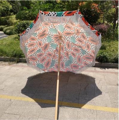 China 2022 China Modern Fantastic Luxury Tassel Beach Umbrella with Fringe, 180/200CM Custom Real Wood Pole Printing Tassels Beach Umbrella for sale