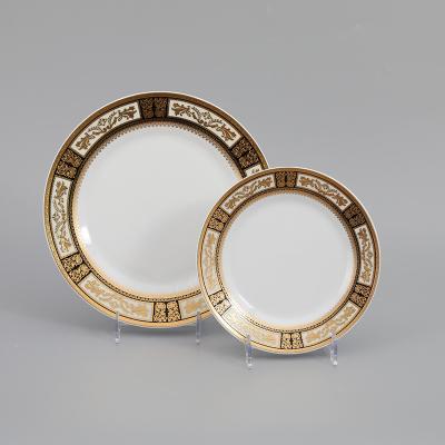 China Viable Cheap Ceramic Dinner Set Of Dishes Logo With Embossed Decal Gold Custom Made Rim Tableware for sale