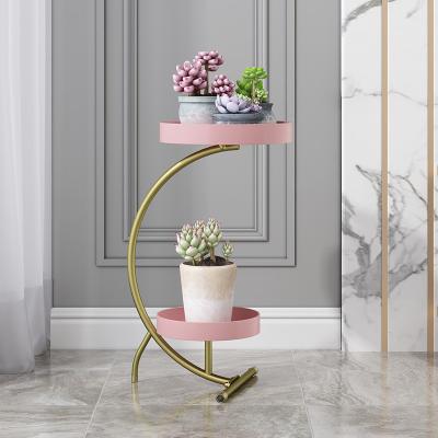 China Modern Minimalist Modern Minimalist Green Radish Small Flower Rack Living Room Wrought Iron Storage Flower Rack Indoor Floor Standing Flower Pot for sale