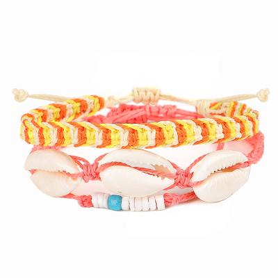 China Handmade Colorful Woven Waterproof Sea Shell Bracelet BOHEMIA Summer Bohemian Stack Wax Rope String Beach Sets for sale