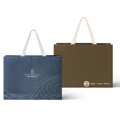 China Recyclable Custom Logo Handbag Craft Shopping Paper Bag Folding Paper Bag Printed Gift Paper Bag for sale