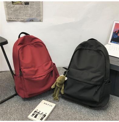 China Large capacity fashion shoulder bag girls backpack wholesale pure nylon bag with zipper for attached gender neutral small doll for sale